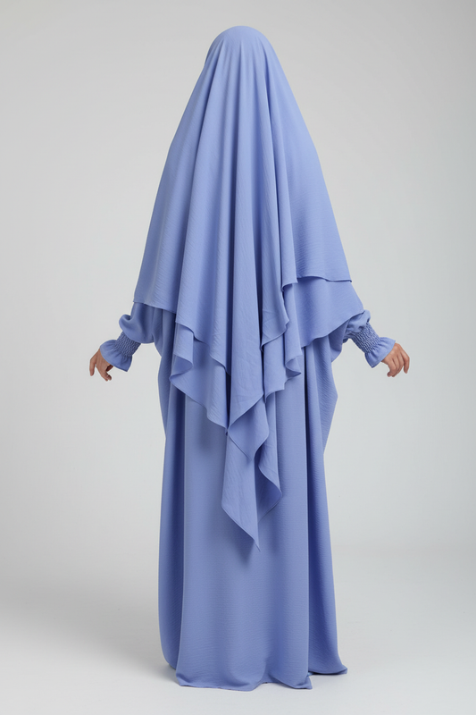 Blå jilbab studiobakgrund
